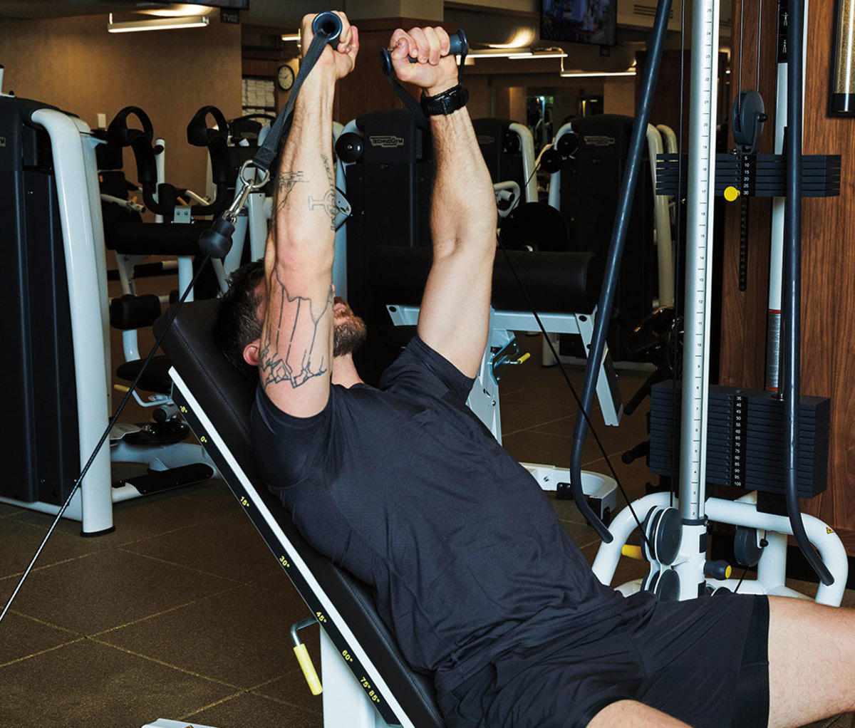 Inclined cable routing to the chest press
