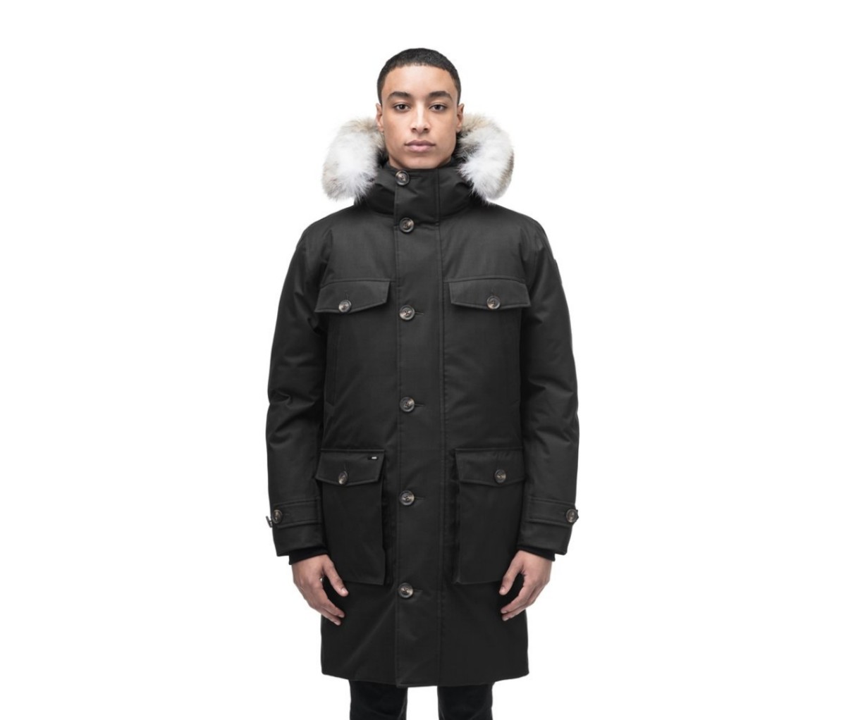 Man wearing a Nobis Citizen Men's Tailored Parka puffer jacket