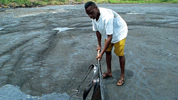 Trinidad's Pitch Lake - Where Every Road Starts - Men's Journal