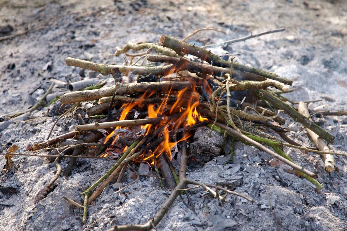 Making A Fire How to build a fire with advice from survivalist Hakim Isler - Men's ...