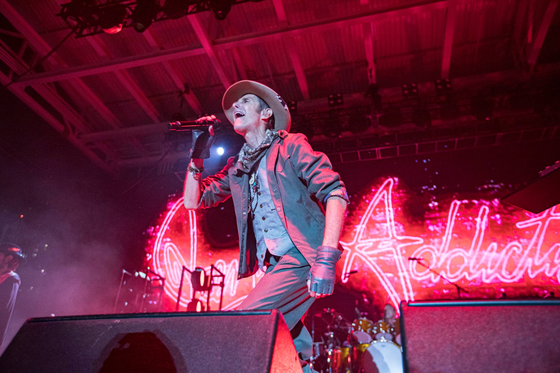 Iconic Rock Band's Lead Singer Slapped With Lawsuit After Onstage Fight ...