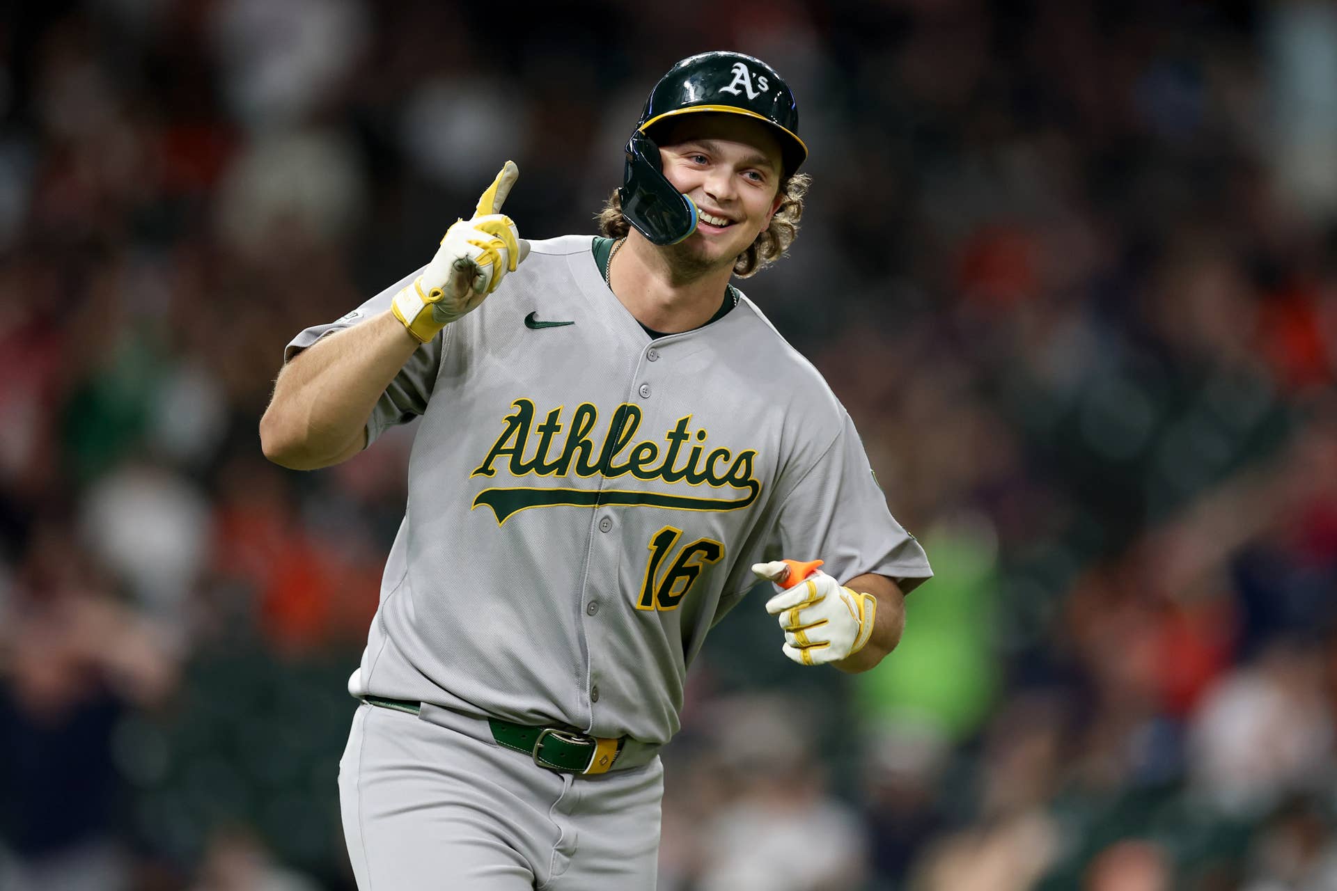 Nick Kurtz #16 of the Athletics reacts after hitting his fourth home run of the game in the ninth inning against the Houston Astros at Daikin Park on July 25, 2025 in Houston, Texas.