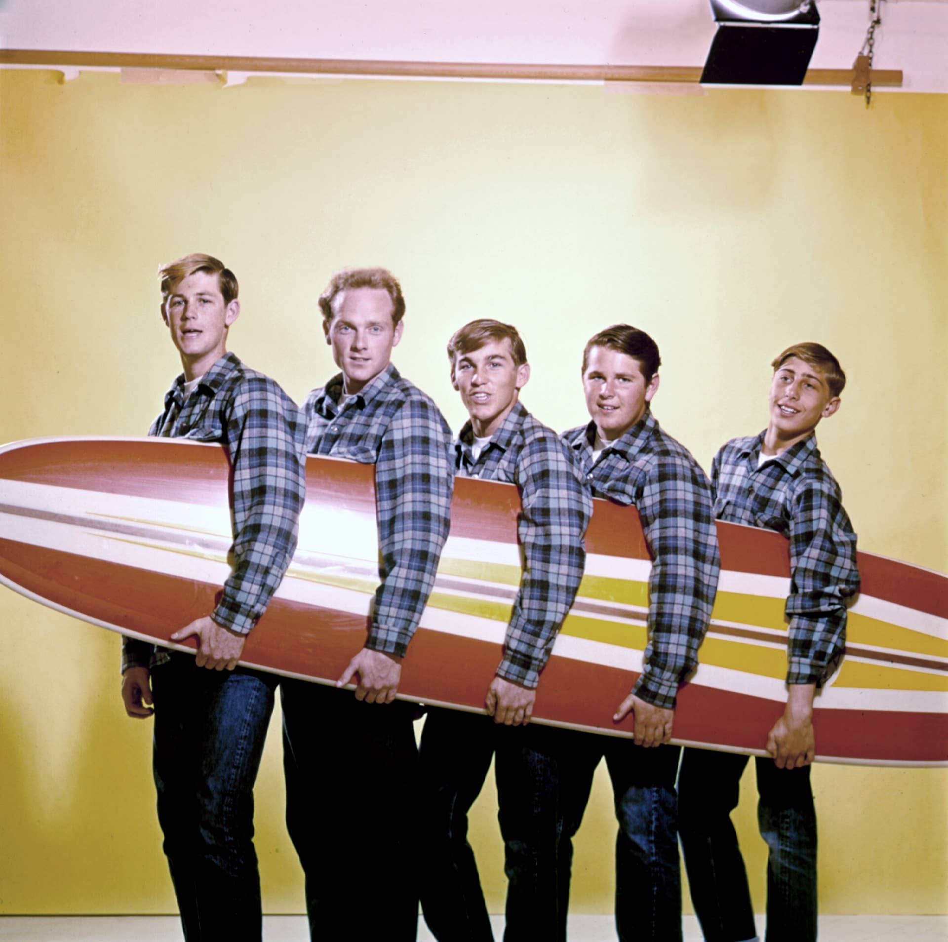 beach-boys-with-a-surfboard.jpg