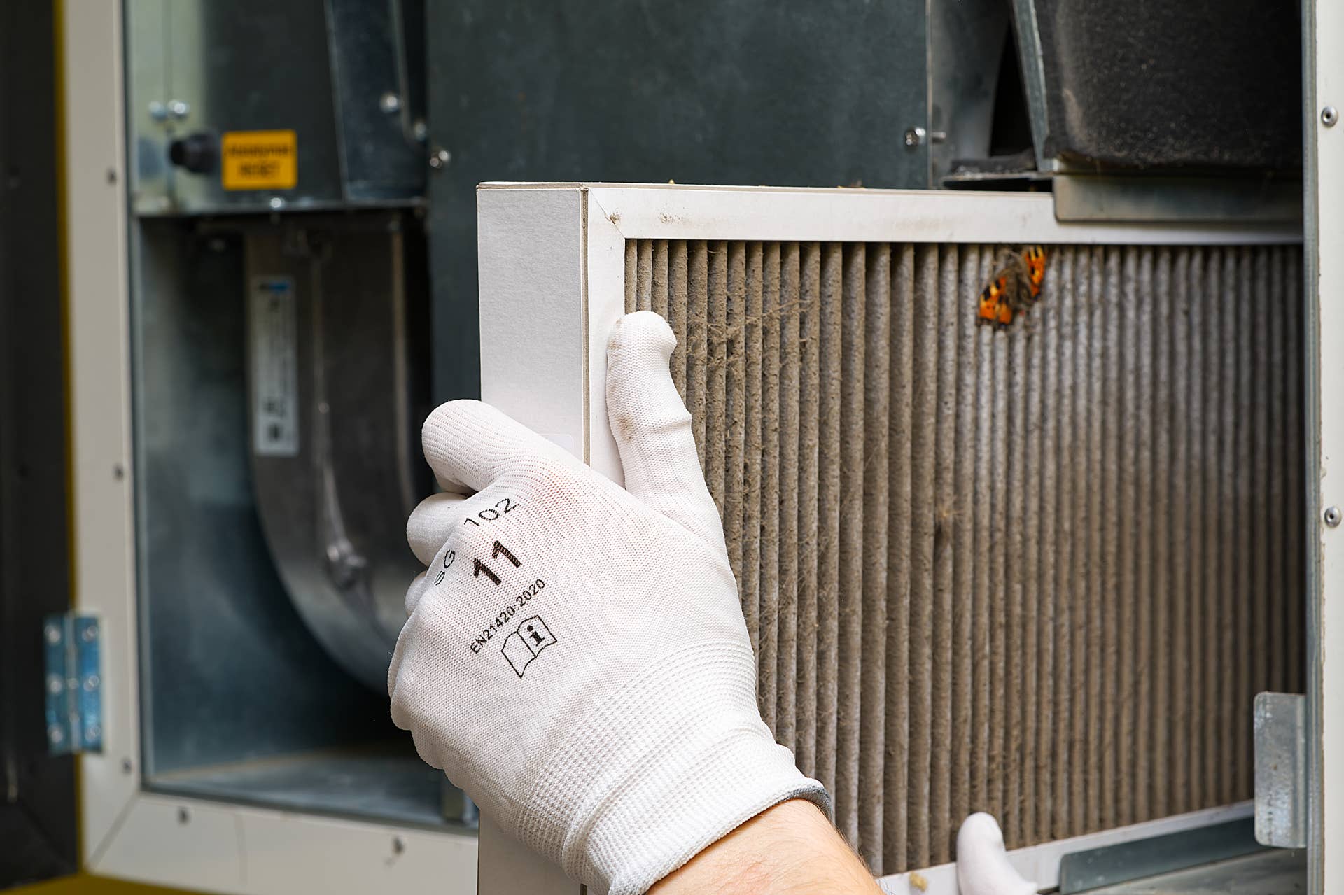 How to Change an Air Conditioner Filter Correctly - Men's Journal