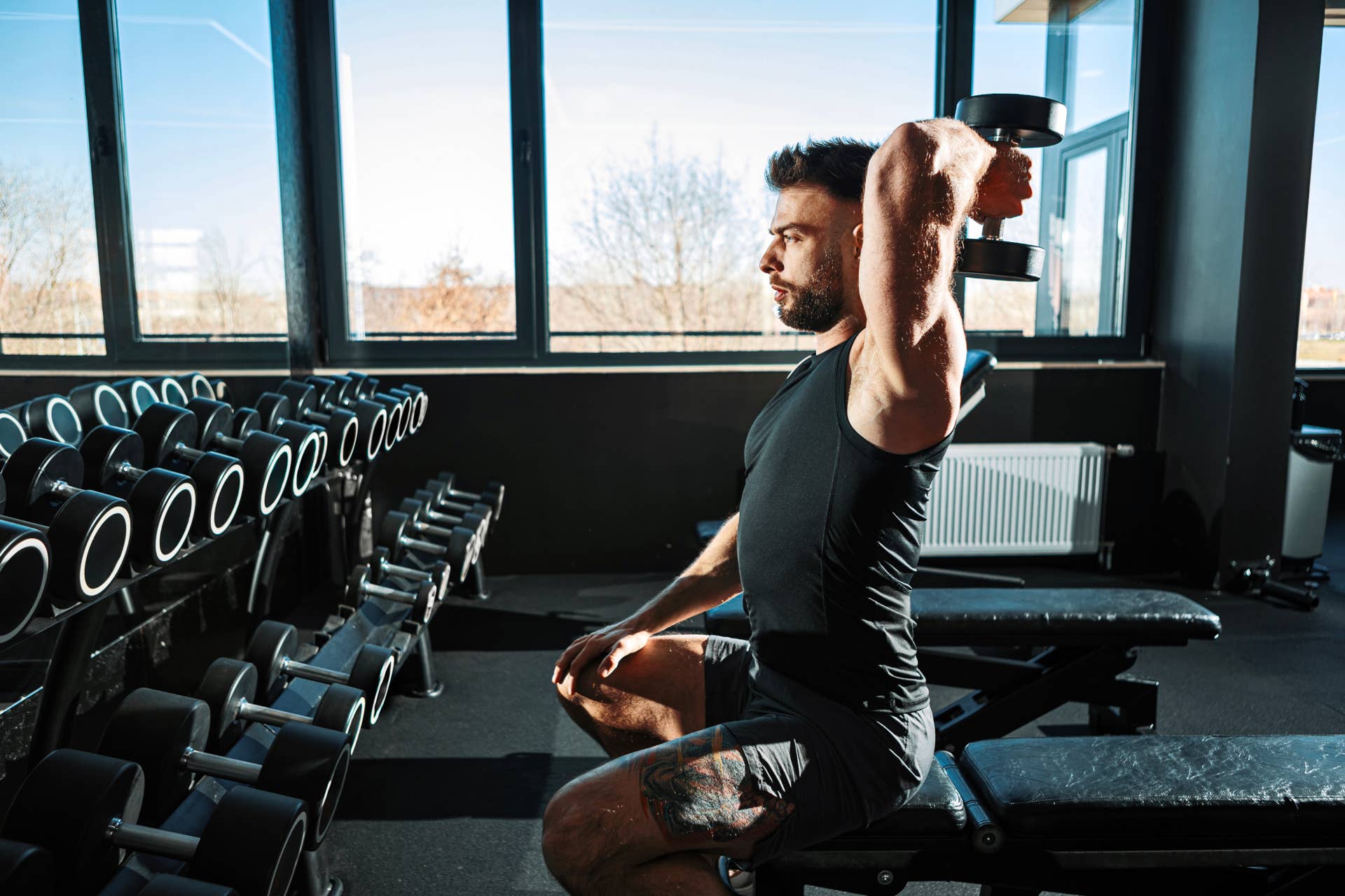 These Are the Only Two Dumbbell Exercises You Need to Build Size in Your Triceps, According to a Top Trainer