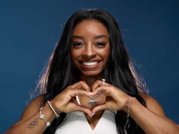Simone Biles Turns Heads in Striped Bikini for Birthday… 