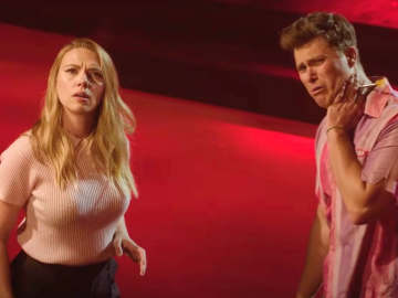 Sarah Sherman Shoots Colin Jost In Hilarious Promo for Scarlett Johansson