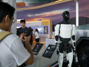 New Tesla Optimus Video Shows Humanoid Robot Doing Household… 