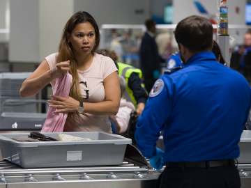 Expert Warns to Never Put Your Phone in a TSA Airport Security… 