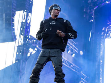 Rapper Slammed for Forcing Teen Fan to Stage Dive, Hospitalizing… 