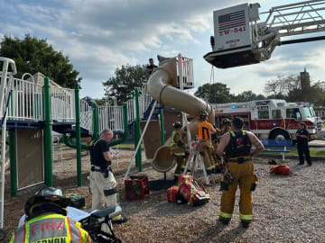 Firefighters Mount Rescue Effort for Man Trapped in Children