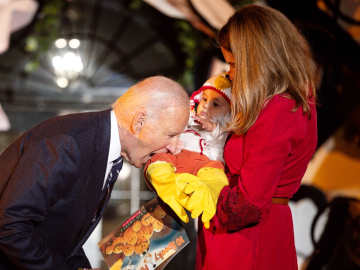 Biden Pretends to Chomp Baby Dressed as Chicken at Halloween… 