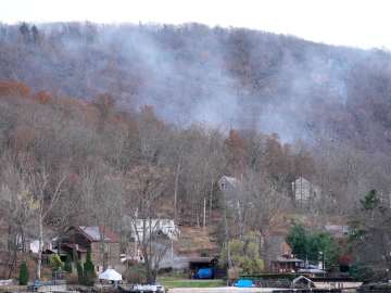 Rare East Coast Wildfire Threatens Dozens of… 