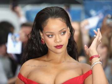 Rihanna Turns Heads in See-Through Skirt to Support A$AP… 