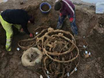 Archaeologists Find 2,000-Year-Old Cache of Iron Age… 