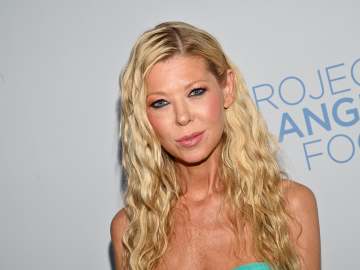 Tara Reid, 49, Looks Radiant in Red Carpet… 