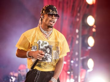 Dead Body Found Inside Tesla Belonging to Singer… 