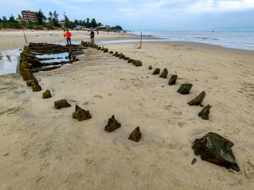 Typhoon Unearths Centuries-Old… 