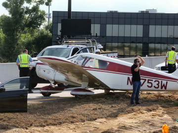 Terrifying Video Shows Plane Crashing Into Car on Busy… 