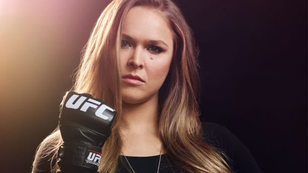 The VERY glamorous UFC WAGS on the arms of some of the world's toughest  fighters