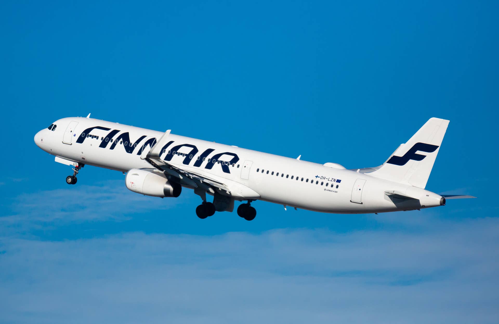 Airbus A321 of Finnair Airlines flies up from Barcelona Airport (BCN).