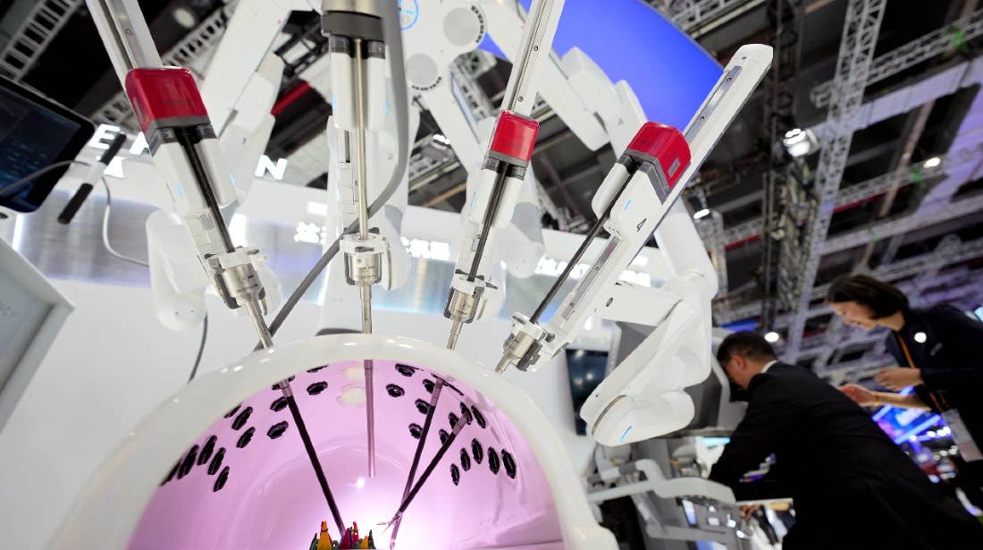 A Da Vinci surgical robot is on display during at the National Exhibition and Convention Center on November 8, 2023 in Shanghai, China.