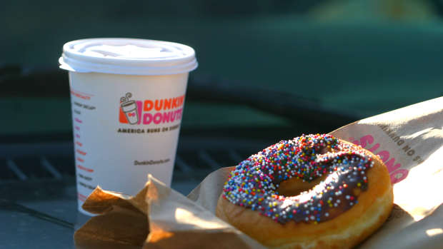 Brooklyn, New York, USA - April 12, 2014: A Dunkin Donuts coffee and doughnut. 