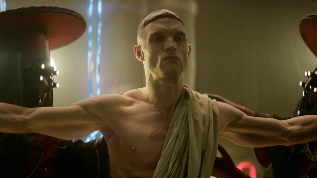 Close-up image of Ed Skrein shirtless as Admiral Atticus Noble in 'Rebel Moon'