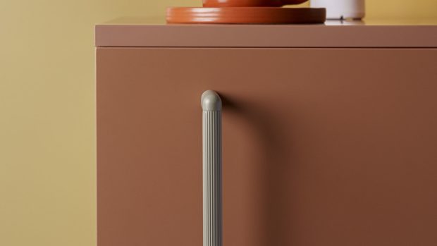 Riss Small cabinet pull in a contrasting midcentury color palette.