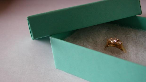 Close up of diamond engagement ring in box