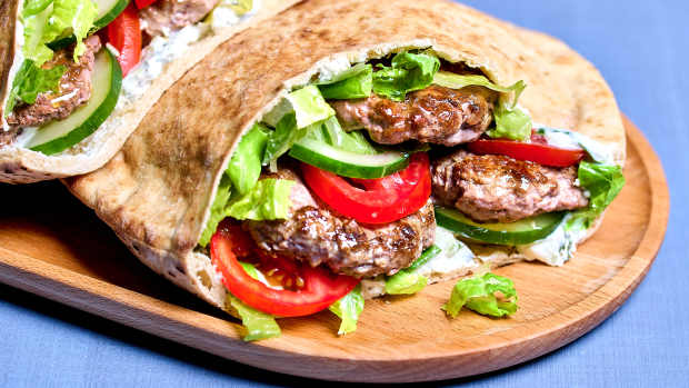 WASHINGTON, DC - JUNE 11: Lamb Pita Sandwiches With Tzatziki for Dinner in Minutes column in Food photographed on June 11, 2024 in Washington, DC. (Photo by Peggy Cormary for The Washington Post via Getty Images; food styling by Lisa Cherkasky for The Washington Post via Getty Images)