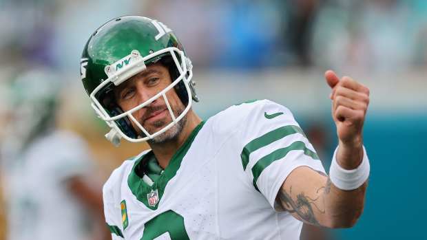 Aaron Rodgers #8 of the New York Jets looks on during warmups before the game against the Jacksonville Jaguars at EverBank Stadium on December 15, 2024 in Jacksonville, Florida.