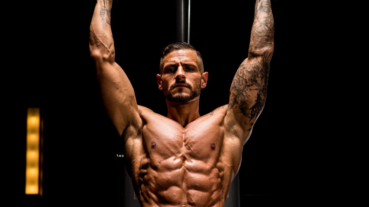Male body builder posing in studio background - stock photo 2705151 |  Crushpixel