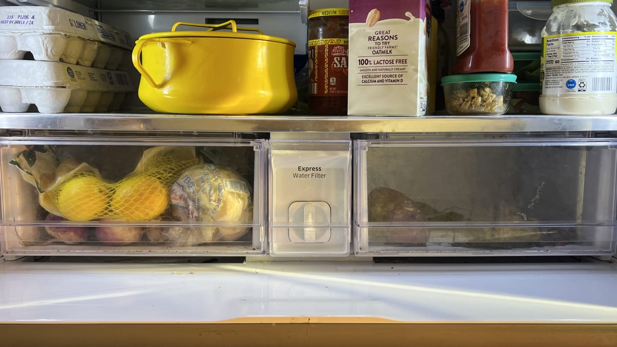 What is the correct way to clean the refrigerator and the freezer?