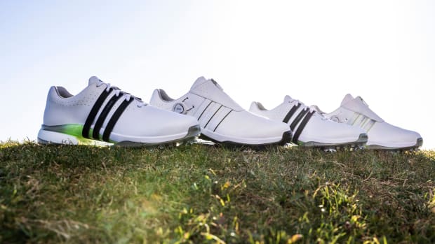 Adidas golf shoes history clearance