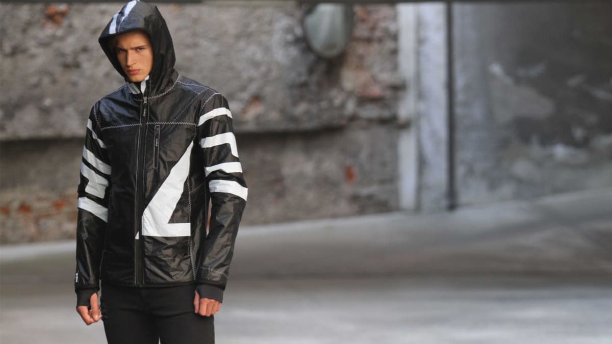 An Italian brand is upcycling old surf kites into high fashion Men s