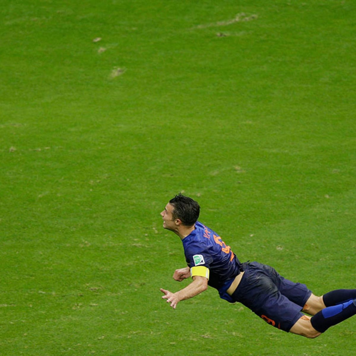 Soccer player heads ball on hi-res stock photography and images