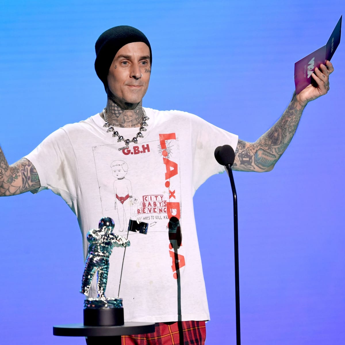 Travis Barker Sold His Blood-Soaked Shoes for Thousands of Dollars - Men's  Journal