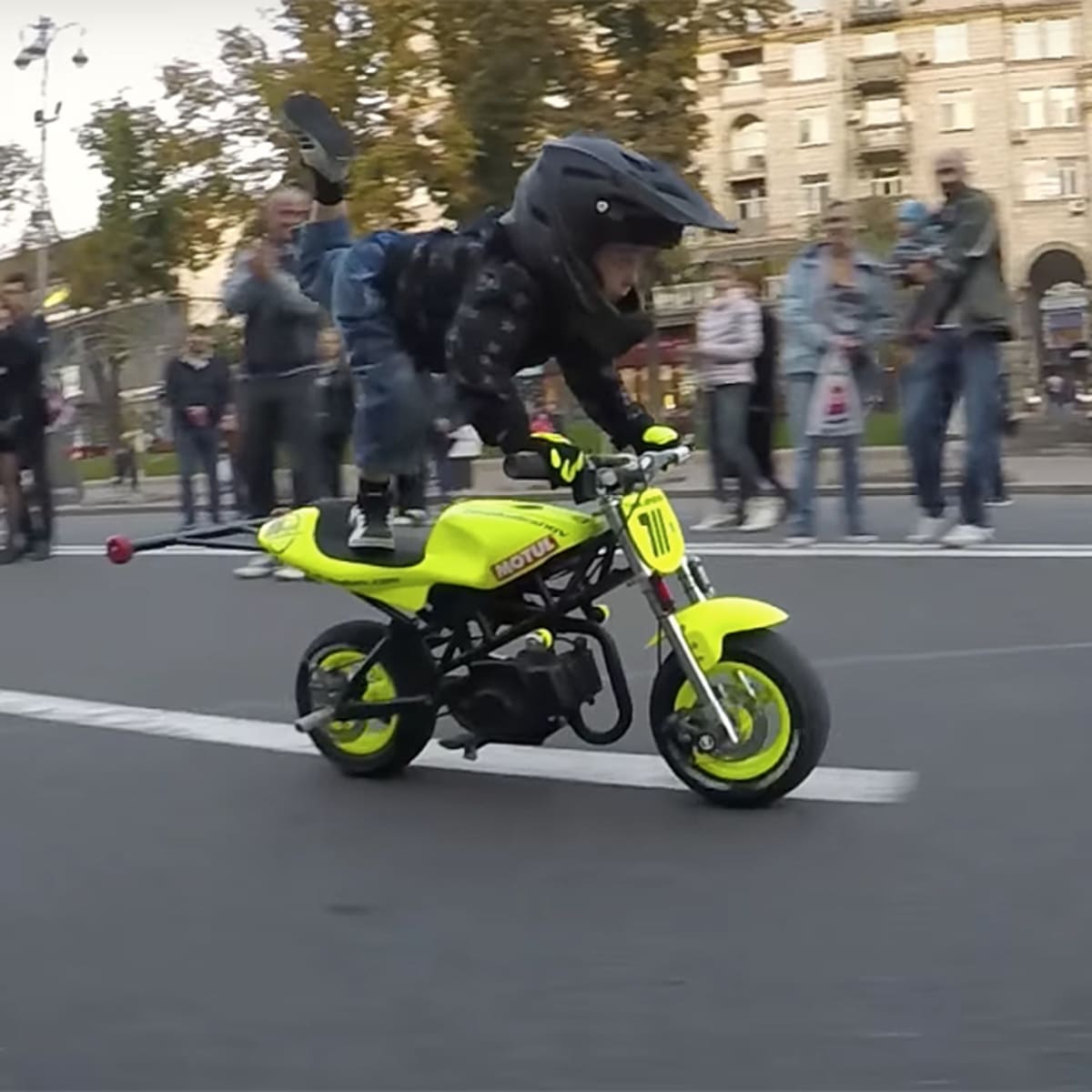 4 year old shop boy riding motorcycle