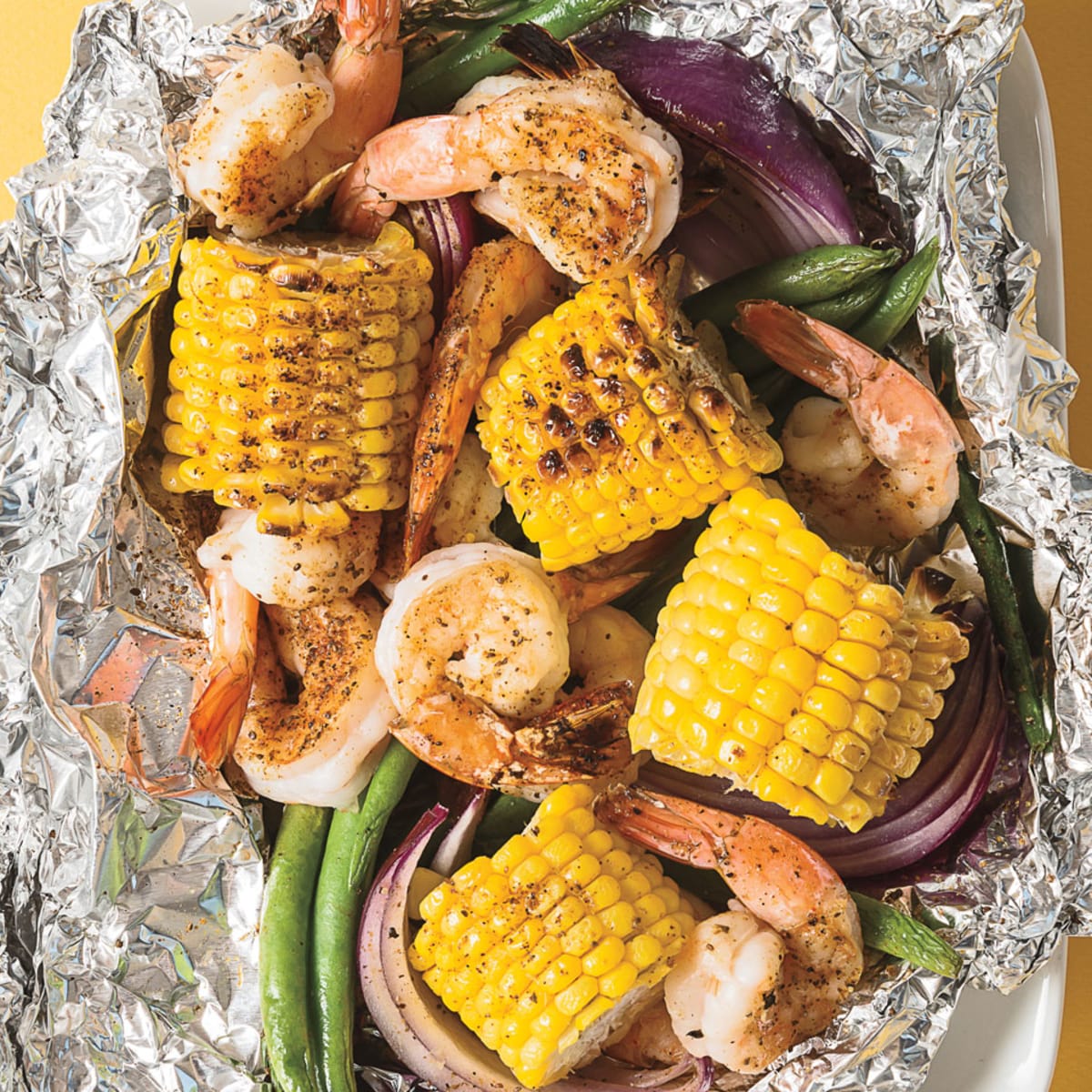 Cajun grilled shrimp and vegetable packets