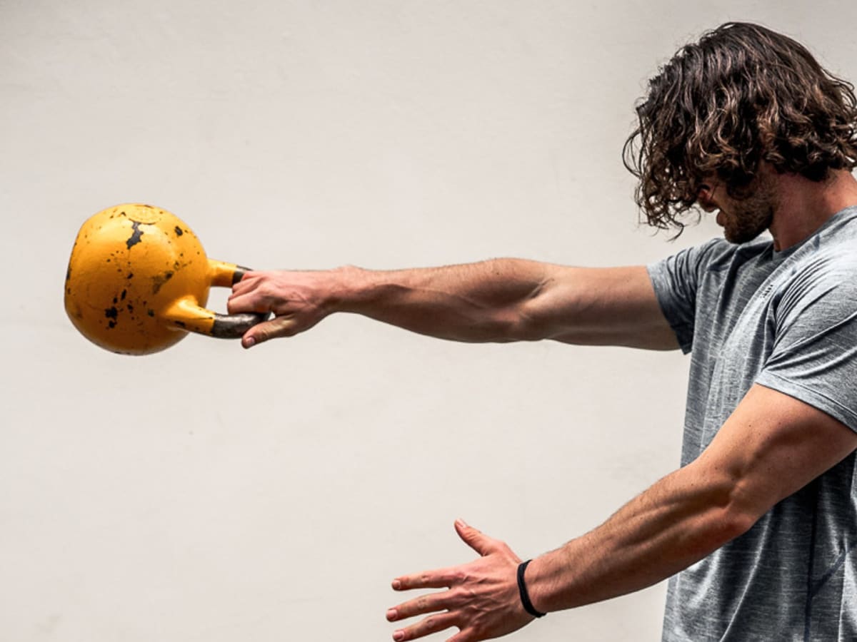 10 Kettlebell Workouts to Get Six Pack Abs Men s Journal