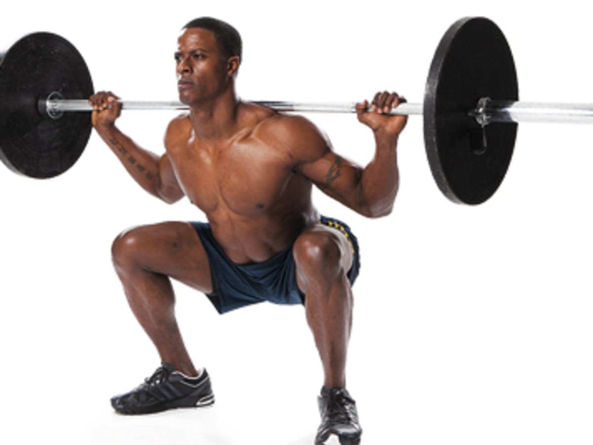 Barbell between sales legs squat