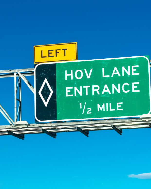High occupancy vehicle lane entrance overhead road sign.
