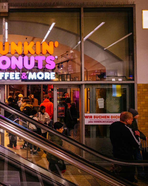 Customers queue at a Dunkin' Donuts Inc. store in Berlin, Germany, on Saturday, Feb. 4, 2023. Traders will be looking to key data on the German economy next week including Januarys preliminary inflation data and industrial production figures. Photographer: Jacobia Dahm/Bloomberg via Getty Images