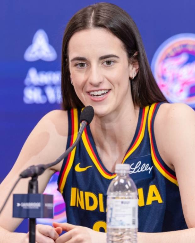 Caitlin Clark #22 of the Indiana Fever talks to reporters during media day activities at Gainbridge Fieldhouse on May 1, 2024 in Indianapolis, Indiana. 