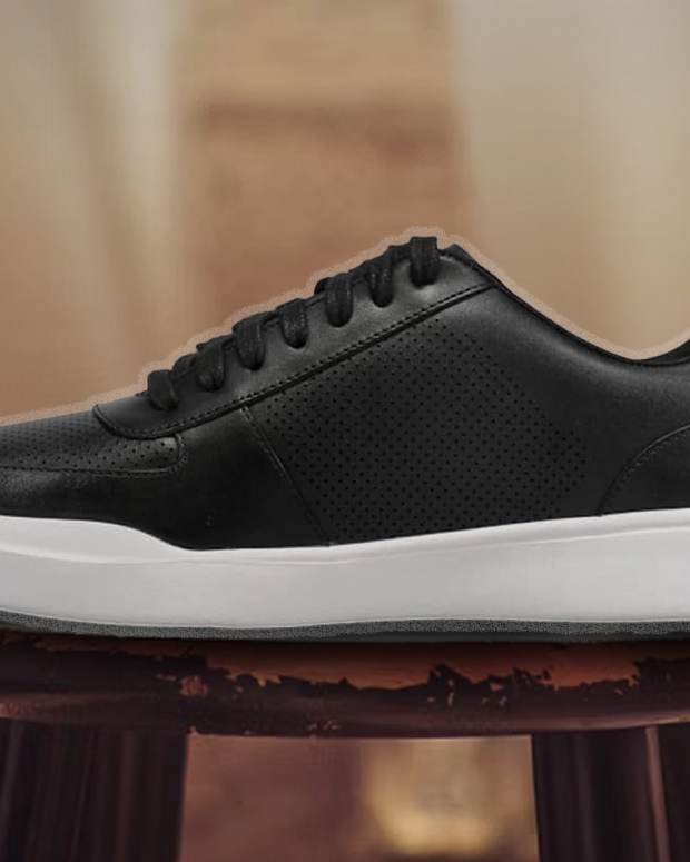 The Cole Haan Grand Crosscourt Modern Perforated Sneakers in Black are on sale right now at Amazon
