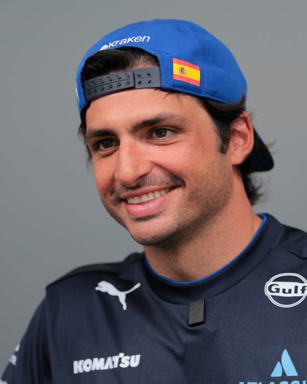 May 1, 2025; Miami Gardens, FL, USA; Williams driver Carlos Sainz (55) looks on from the paddock at Miami International Autodrome. Mandatory Credit: Sam Navarro-Imagn Images