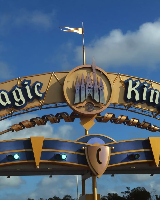 ORLANDO, FL - APRIL 3: A sign for the Magic Kingdom hangs above the entrance to the grounds of the park at Walt Disney World on April 3, 2025, in Orlando, Florida. (Photo by Gary Hershorn/Getty Images)