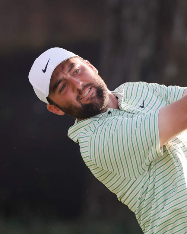 Mar 9, 2024; Orlando, Florida, USA; Scottie Scheffler plays his shot from the 17th tee during the third round of the Arnold Palmer Invitational golf tournament.