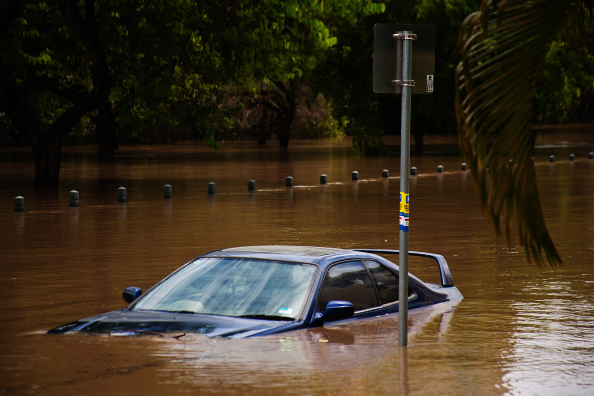 Car submerged in floodwaters